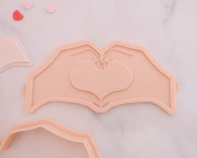 Load image into Gallery viewer, Heart Hands Fondant Embosser and Cutter - Made in the UK with Love from House of Toot Sweet - Just £6.50! Shop now at House of Toot Sweet