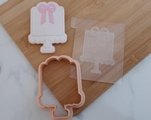Load image into Gallery viewer, Cake with Bow Fondant Embosser and Cutter - Made in the UK with Love from House of Toot Sweet - Just £6.50! Shop now at House of Toot Sweet