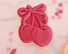 Load image into Gallery viewer, Cherries with Bow Fondant Pop Embosser and Cutter - Made in the UK with Love from House of Toot Sweet - Just £6.50! Shop now at House of Toot Sweet
