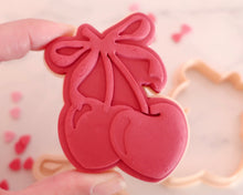 Load image into Gallery viewer, Cherries with Bow Fondant Pop Embosser and Cutter - Made in the UK with Love from House of Toot Sweet - Just £6.50! Shop now at House of Toot Sweet