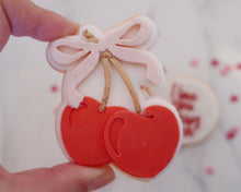 Load image into Gallery viewer, Cherries with Bow Fondant Pop Embosser and Cutter - Made in the UK with Love from House of Toot Sweet - Just £6.50! Shop now at House of Toot Sweet