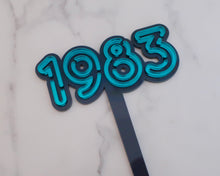 Load image into Gallery viewer, 4'' 80s Neon lights 1983 Cake topper - Made in the UK with Love from House of Toot Sweet - Just £6! Shop now at House of Toot Sweet