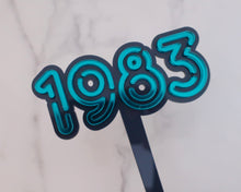 Load image into Gallery viewer, 4'' 80s Neon lights 1983 Cake topper - Made in the UK with Love from House of Toot Sweet - Just £6! Shop now at House of Toot Sweet