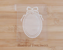 Load image into Gallery viewer, Pearl Frame with Bow Fondant Embosser / Cutter - Made in the UK with Love from House of Toot Sweet - Just £6.50! Shop now at House of Toot Sweet