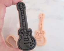 Load image into Gallery viewer, Electric Guitar Fondant Cookie Stamp / Cutter - Made in the UK with Love from House of Toot Sweet - Just £6.50! Shop now at House of Toot Sweet