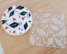 Load image into Gallery viewer, Graduation Caps & Scrolls Texture Fondant Cookie Embosser - Made in the UK with Love from House of Toot Sweet - Just £7! Shop now at House of Toot Sweet