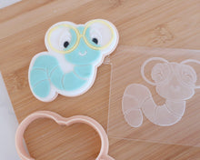 Load image into Gallery viewer, Bookworm Fondant Cookie Embosser / Cutter - Made in the UK with Love from House of Toot Sweet - Just £6.50! Shop now at House of Toot Sweet