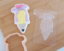 Load image into Gallery viewer, Pencil With Bow Fondant Cookie Embosser / Cutter - Made in the UK with Love from House of Toot Sweet - Just £6.50! Shop now at House of Toot Sweet