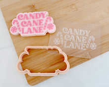 Load image into Gallery viewer, Candy Cane Lane Cookie Cutter & Embosser - Made in the UK with Love from House of Toot Sweet - Just £6.50! Shop now at House of Toot Sweet