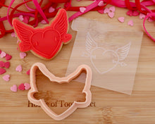 Load image into Gallery viewer, Winged Heart With Arrow Embosser / Cutter - Made in the UK with Love from House of Toot Sweet - Just £6! Shop now at House of Toot Sweet