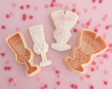 Load image into Gallery viewer, Champagne Glasses with Bow Stamp / Cutter - Made in the UK with Love from House of Toot Sweet - Just £5.50! Shop now at House of Toot Sweet