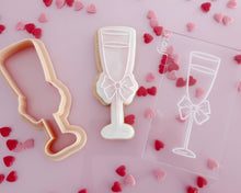 Load image into Gallery viewer, Champagne Glass with Bow Embosser / Cutter - Made in the UK with Love from House of Toot Sweet - Just £5.50! Shop now at House of Toot Sweet