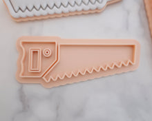 Load image into Gallery viewer, Construction Hand Saw Fondant Cookie Stamp / Cutter - Made in the UK with Love  from House of Toot Sweet - Just £6.50! Shop now at House of Toot Sweet
