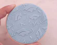 Load image into Gallery viewer, Graduation Caps &amp; Scrolls Texture Fondant Cookie Embosser - Made in the UK with Love  from House of Toot Sweet - Just £7! Shop now at House of Toot Sweet

